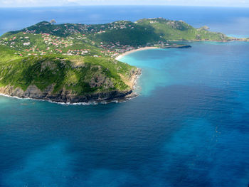 Scenic view of sea against blue sky