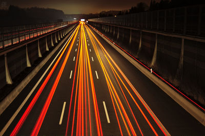 Light trails on road at night