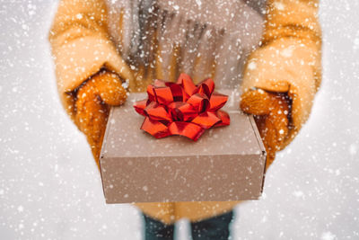 High angle view of gift on snow