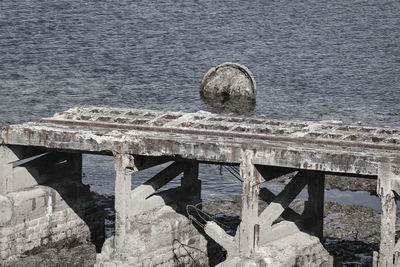 High angle view of old pier over sea