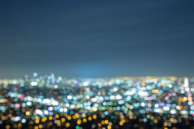 High angle view of illuminated buildings at night