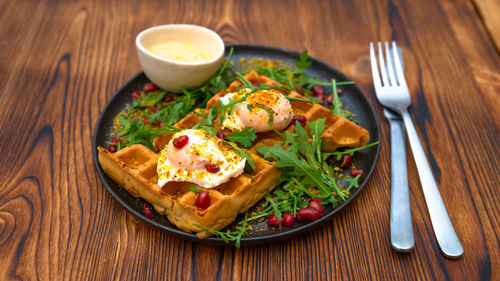 High angle view of breakfast served on table