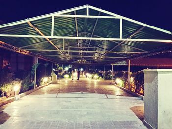 Empty corridor of building at night