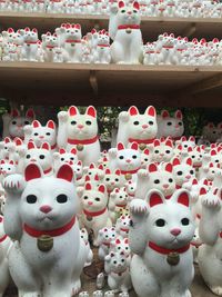 Close-up of figurines on wall