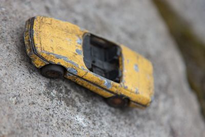 High angle view of rusty toy car