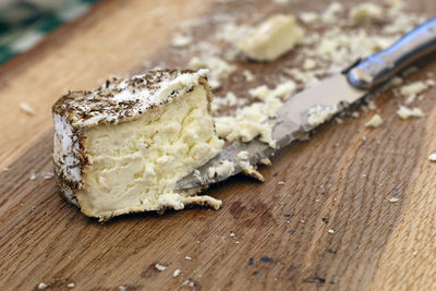 Close-up of cheese on cutting board