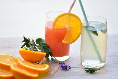 Fruits in glass on table