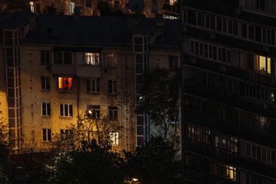 High angle view of illuminated buildings at night