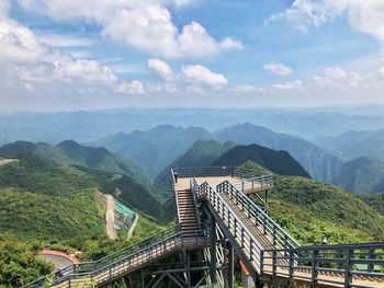 Panoramic view of bridge and mountains against sky