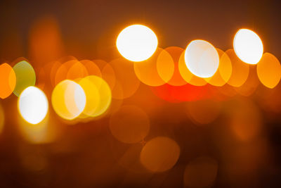 Defocused image of illuminated lights at night