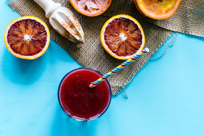 High angle view of oranges in glass on table