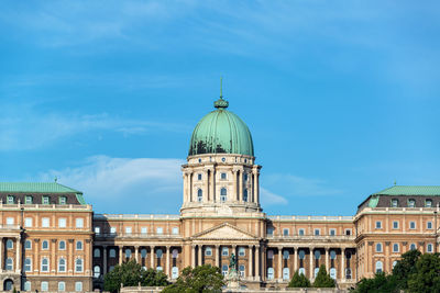Buildings against blue sky