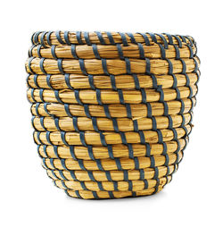 High angle view of wicker basket on white background