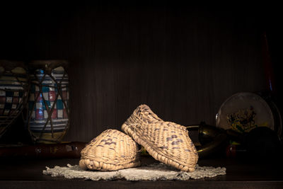 Close-up of cross on table at home