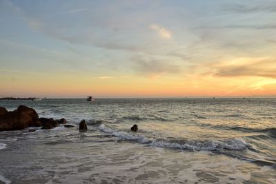 Scenic view of sea against sky during sunset