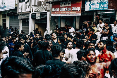 People on street in city