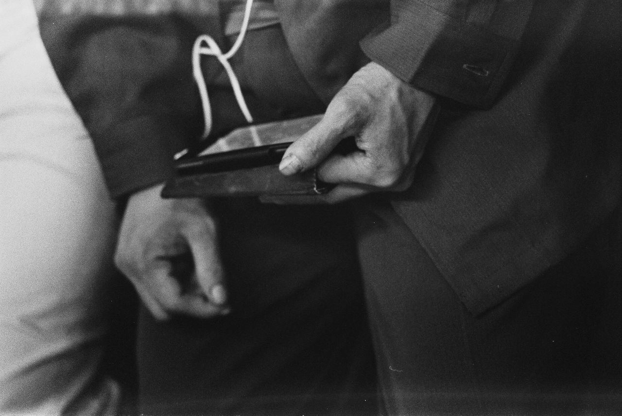 indoors, person, low section, part of, midsection, men, lifestyles, close-up, human foot, high angle view, cropped, holding, unrecognizable person, textile