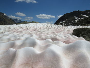 Scenic view of rocks against sky during winter