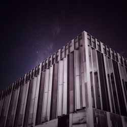 Low angle view of building against sky at night