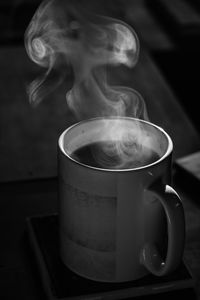 Close-up of coffee cup on table