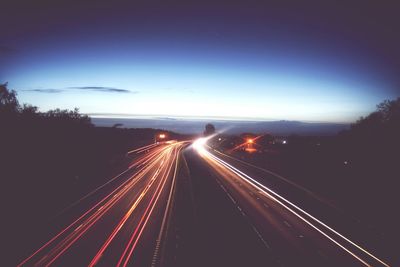 Light trails on road at night