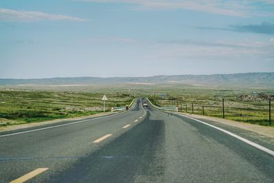 Road on landscape against sky