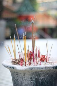 Close-up of incense sticks in temple