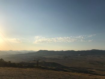 Scenic view of landscape against sky during sunset