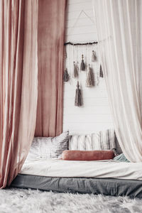 Interior in the style of boho and macrame and a wall