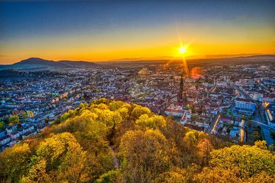 High angle view of townscape against sky during sunset