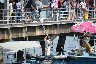 People working in harbor