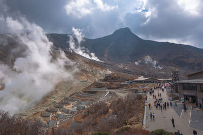 High angle view of city against cloudy sky