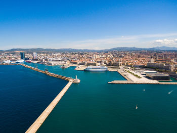 High angle view of marina and buildings in city