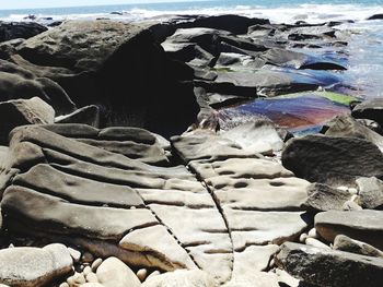 Close-up of stones on beach
