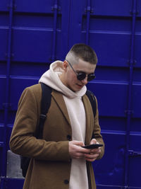 Young man using mobile phone