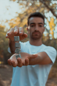 Young man showing art of levitation