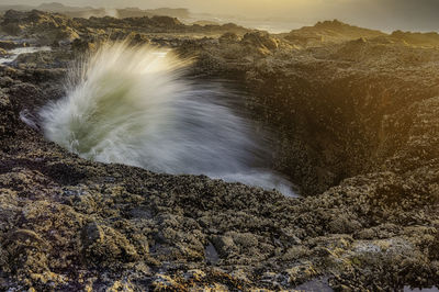 Scenic view of sea and rocks