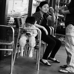 Women sitting on chair