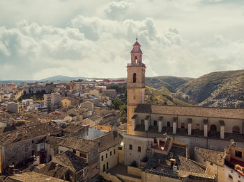 High angle view of buildings against sky in city