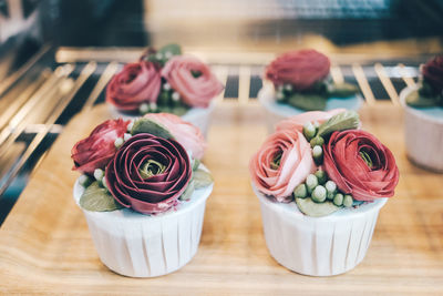 Close-up of roses on table