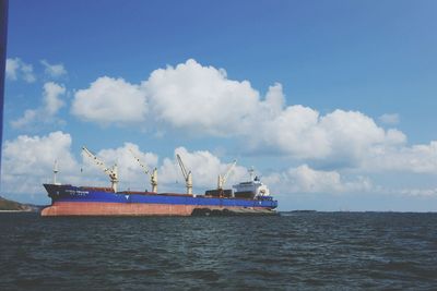 Ship in sea against sky