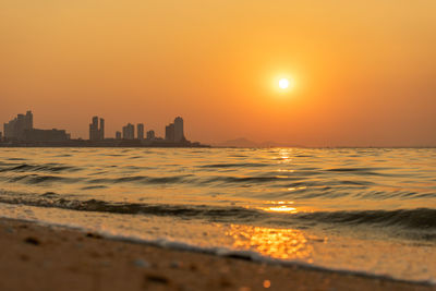 Scenic view of sea against sky during sunset