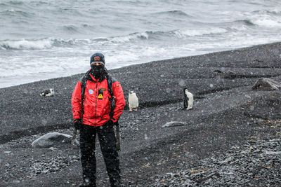 People standing on beach