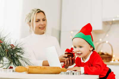 Mother and son at kitchen