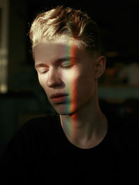 Close-up portrait of a serious young man