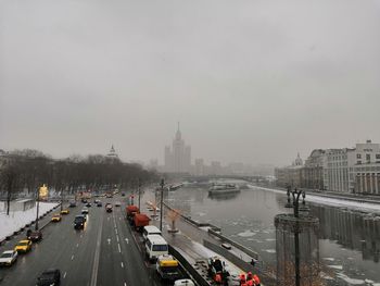 Traffic on road in city during rainy season