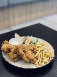 Close-up of food in plate on table