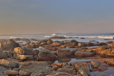 Scenic view of sea against sky during sunset