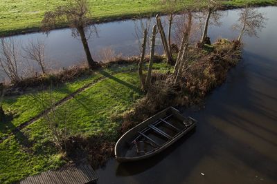 High angle view of boat moored on lake