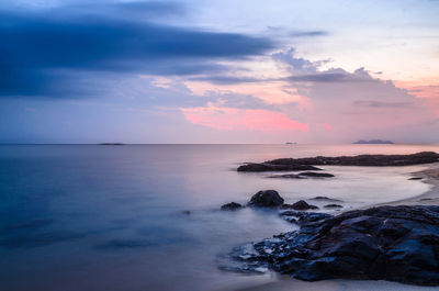 Scenic view of sea against sky at sunset